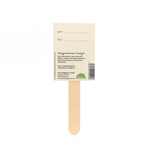 Quédese con un cartel de papel rectangular, con campos de texto "de:" y "para:" e información sobre las semillas de judías verdes en alemán.
