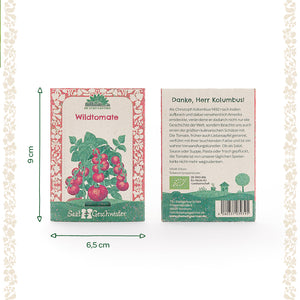 Dos paquetes de semillas de tomate silvestre de "Die Stadtgärtner" de 9 cm de alto y 6,5 cm de ancho, con una ilustración de la planta en el anverso y un texto descriptivo en el reverso.