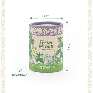 Lata redonda con la inscripción "Fiese Wiese Streuwiese", ilustraciones de flores, dimensiones 6 cm de diámetro, 8,5 cm de alto, peso 55 g.