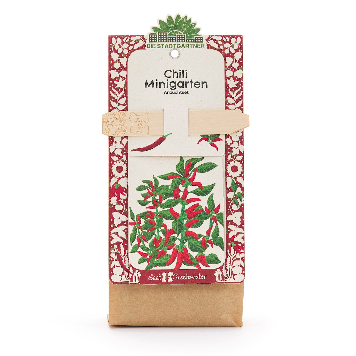 Kit de cultivo de mini huerto de chile de Die Stadtgärtner con motivo de planta rojo y verde en el embalaje.