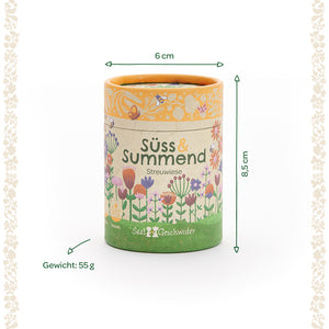 Lata redonda con motivo floral e inscripción “Sweet & Buzzing Meadow”, dimensiones 6 cm de diámetro, 8,5 cm de alto, peso 55 g.