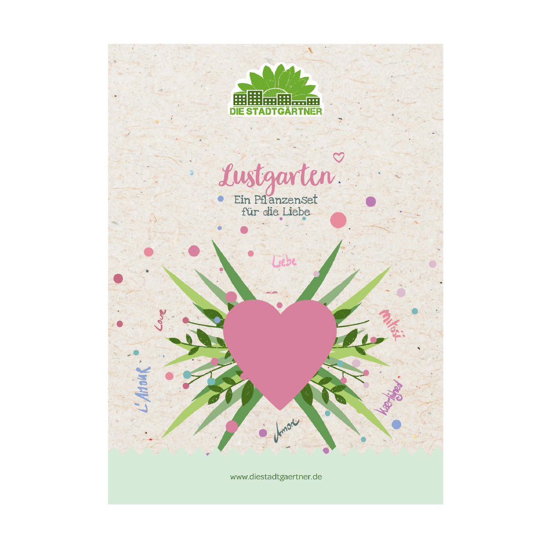 Embalaje para un set de plantas con un gran corazón rosa, hojas verdes y la inscripción “Lustgarten – Un set de plantas para el amor” sobre un fondo beige.