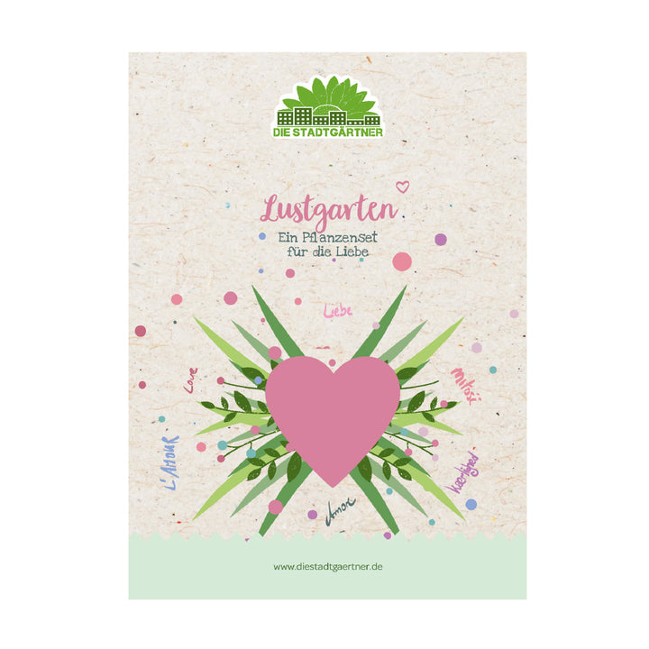 Embalaje para un set de plantas con un gran corazón rosa, hojas verdes y la inscripción “Lustgarten – Un set de plantas para el amor” sobre un fondo beige.