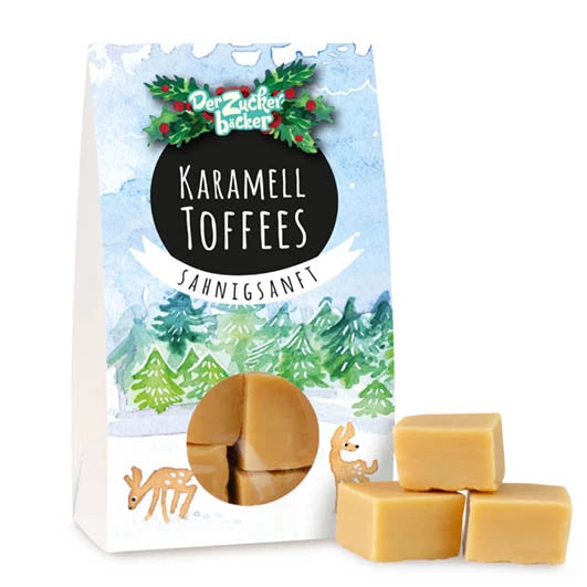 Paquete de toffees de caramelo con motivo navideño y algunos toffees en el exterior del envase.