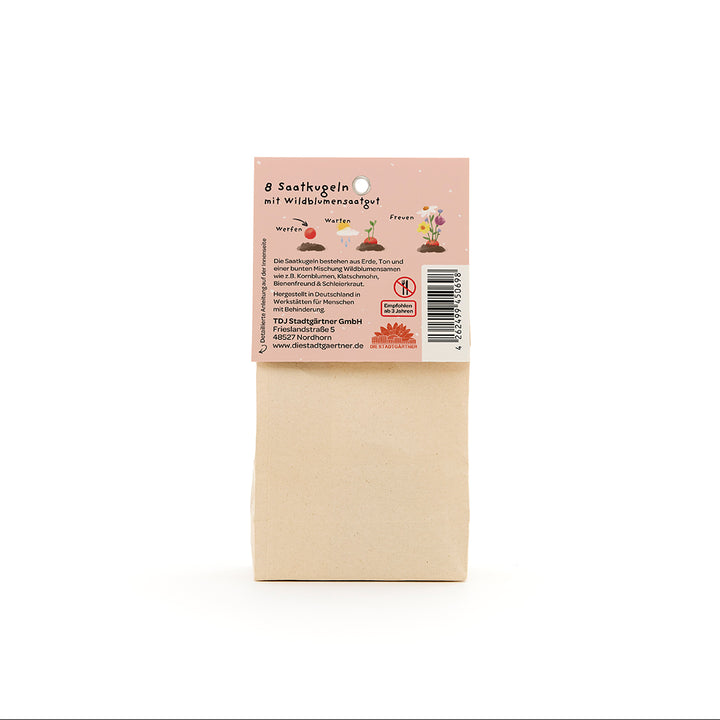 Bolsa de papel con una etiqueta que describe 8 bolas de semillas de flores silvestres, así como información sobre la aplicación e instrucciones del fabricante en alemán.