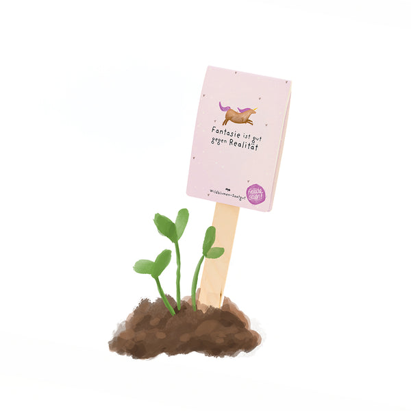 Ilustración de pequeñas plantas que crecen del suelo, junto a un palo de madera con un cartel que dice: "La imaginación es buena contra la realidad" y representa un unicornio.