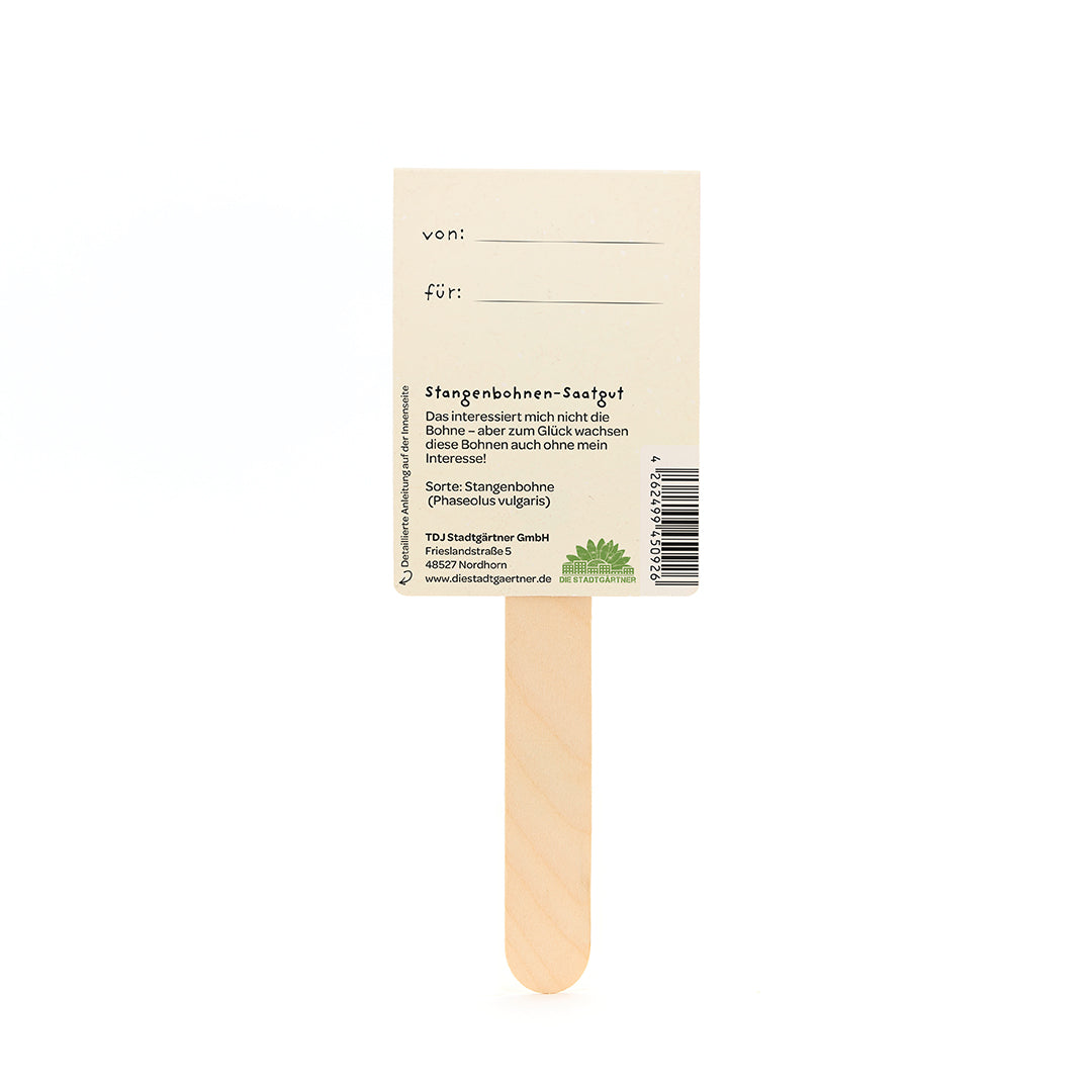 Quédese con un cartel de papel rectangular, con campos de texto "de:" y "para:" e información sobre las semillas de judías verdes en alemán.