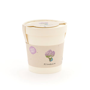 Maceta beige con una etiqueta que muestra un árbol dibujado y las palabras “Árbol del clima”.
