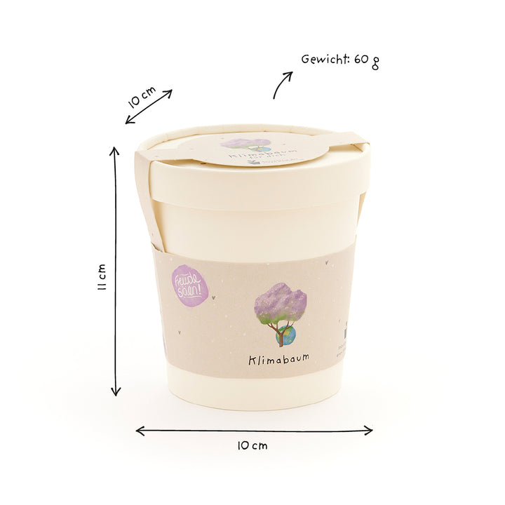 Taza beige con tapa, etiquetada “Climate Tree”, dimensiones dibujadas a mano (10 cm de diámetro, 11 cm de altura) y peso (60 g) sobre un fondo blanco.