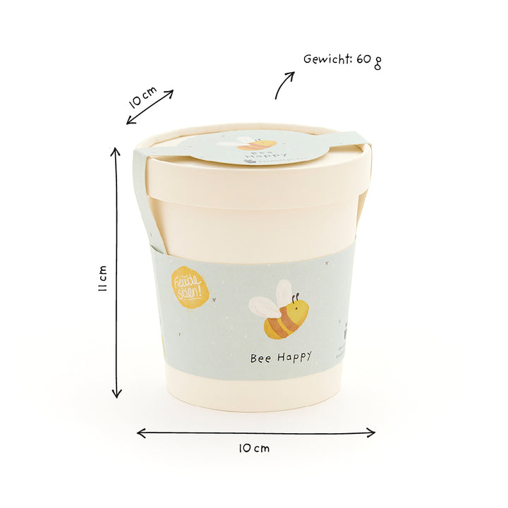 Taza con tapa, motivo de abeja azul claro e inscripción "Bee Happy", dimensiones 11 cm de alto, 10 cm de diámetro, peso 60 g.