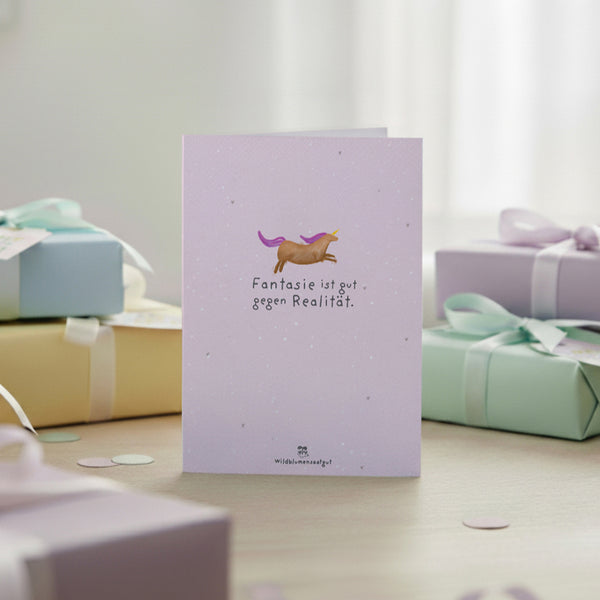 Tarjeta de felicitación - La imaginación es buena contra la realidad.