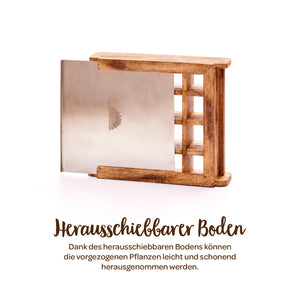 Caja de madera con base metálica extraíble, adecuada para extraer las plantas con cuidado.