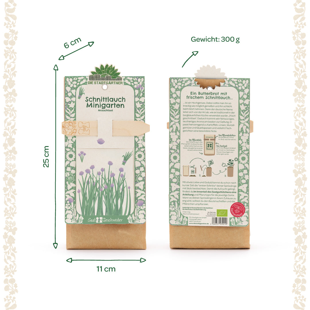 Dos paquetes de un mini kit de cultivo de jardín de cebollino con un patrón floral verde y blanco, dimensiones 25 x 11 x 6 cm, peso 300 g, parte delantera y trasera visibles, información del producto en alemán.