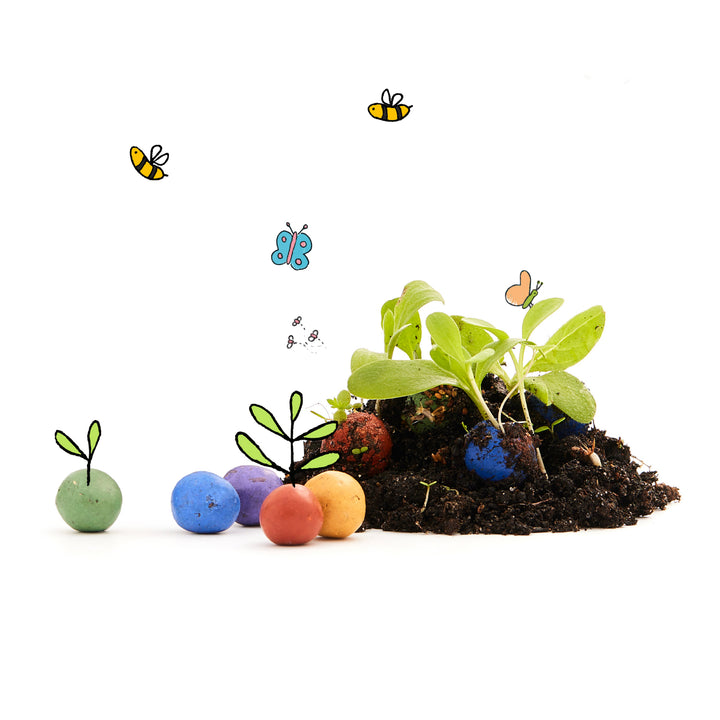 Las plantas jóvenes crecen a partir de frutas de hueso de colores en el suelo con mariposas de dibujos animados en el fondo.