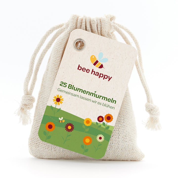 Bolsa de lino con etiqueta "bee happy", 25 canicas de flores, ilustración de flores y una abeja.