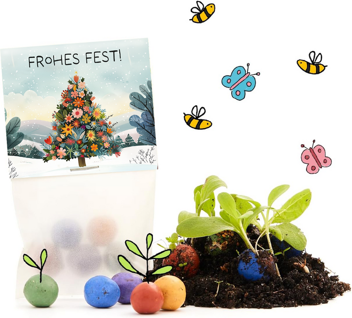 Bolsa con bombas de semillas de colores, plantas, tierra, abejas y mariposas dibujadas, y una tarjeta con un árbol de flores y un saludo de "¡Felices Fiestas!".