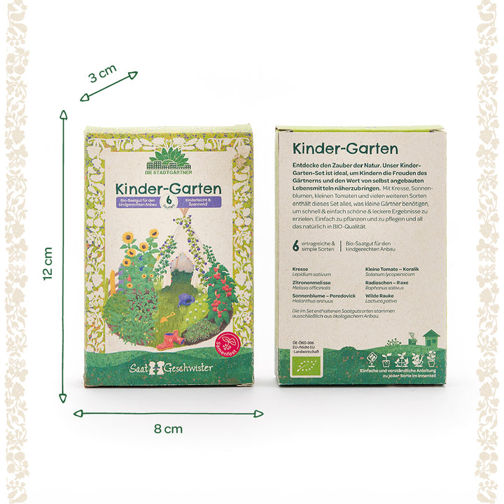 Dos paquetes de semillas orgánicas infantiles "Kinder-Garten" se encuentran uno al lado del otro. La parte frontal presenta un colorido motivo de jardín, mientras que la parte posterior contiene una descripción y un listado de contenidos en alemán. Dimensiones: 12 cm de alto, 8 cm de ancho y 3 cm de profundidad.