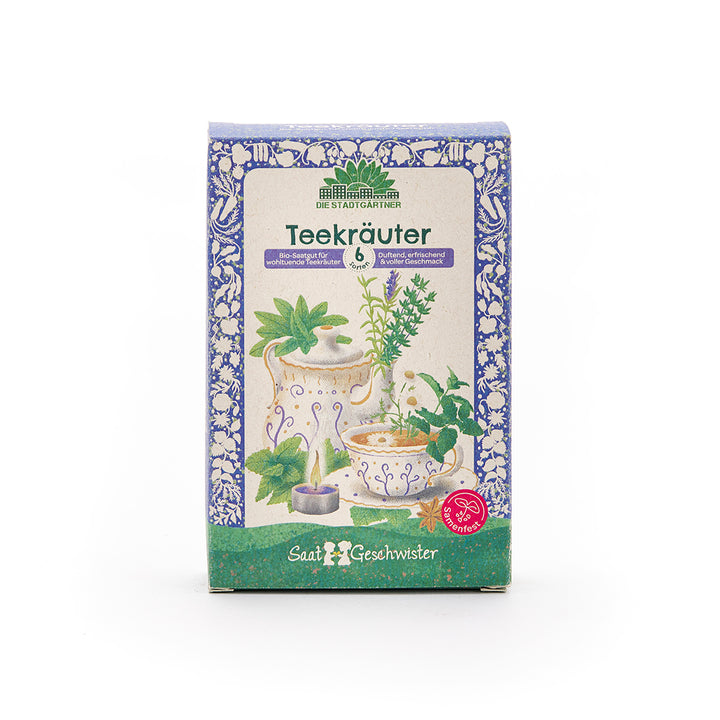 Embalaje para semillas de té de hierbas de Saatgeschwister con tazas de té y hierbas ilustradas en el frente.