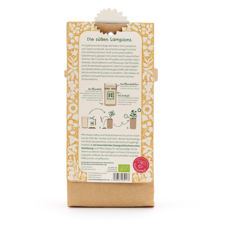 Reverso de un paquete de semillas con un patrón floral amarillo e instrucciones en alemán para plantar Physalis, incluidas ilustraciones de los pasos individuales.