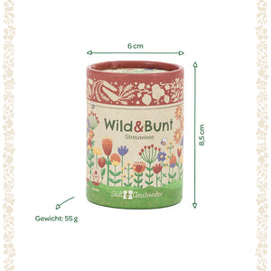 Lata redonda con la inscripción "Wild & Bunt Streuwiese", decorada con flores de colores, dimensiones 6 cm de diámetro y 8,5 cm de altura, peso 55 g.