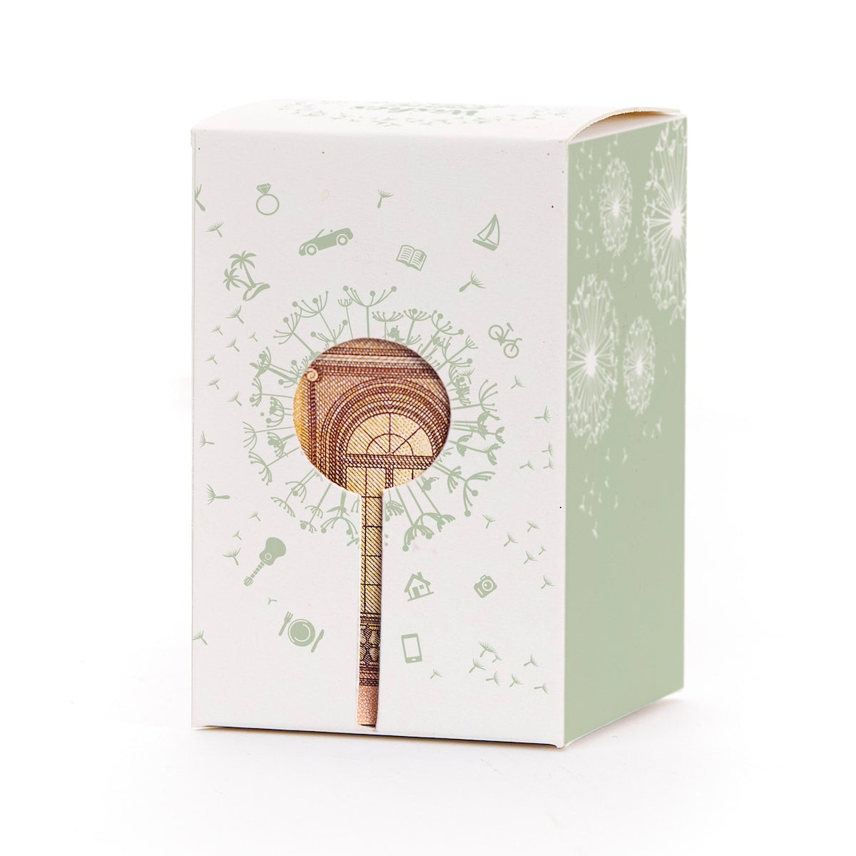 Caja de regalo con motivo de diente de león y billete en forma de piruleta como decoración.