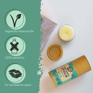 Bálsamo labial natural en envase sin plástico con ingredientes orgánicos veganos, junto a símbolos de propiedades respetuosas con el medio ambiente y labios suaves.