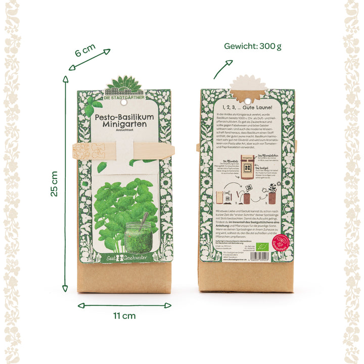 Dos paquetes de un kit de cultivo “Pesto Basil Mini Garden” con detalles de dimensiones (25 cm x 11 cm x 6 cm) y peso (300 g), mostrados frontal y posterior, diseñados en verde y beige.
