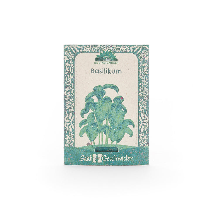Bolsa de semillas para albahaca de la marca "Saatgeschwister" con ilustración de hojas de albahaca en el frente.