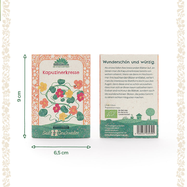 Dos paquetes de semillas de capuchina con ilustraciones de flores coloridas, una descripción y dimensiones de 9 x 6,5 cm sobre un fondo claro.
