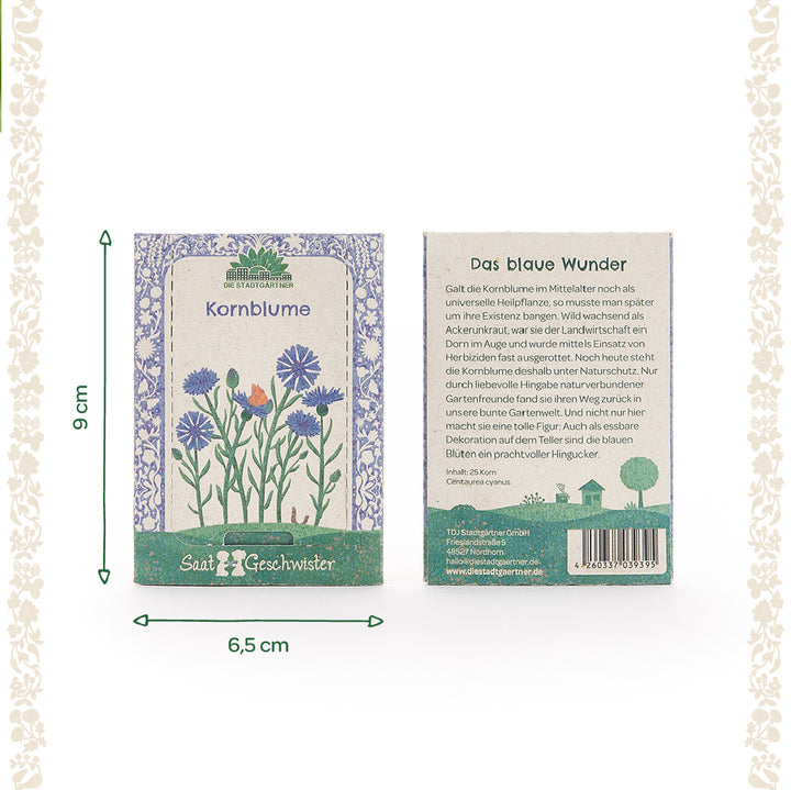 Dos paquetes de semillas de aciano con ilustración floral y descripción del producto en alemán, con dimensiones de 9 cm de alto y 6,5 cm de ancho.