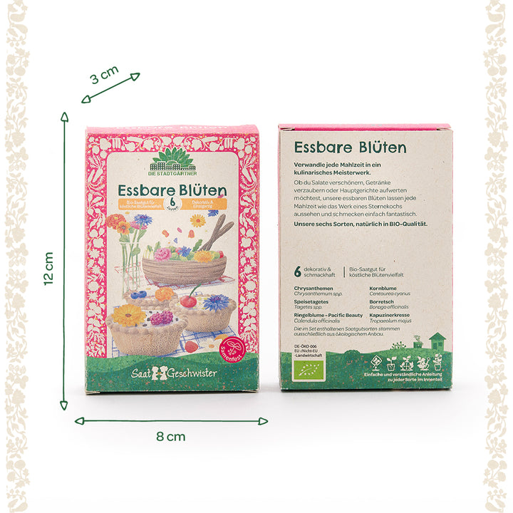 Dos paquetes etiquetados "Flores comestibles" de Die Stadtgärtner, cada uno con ilustraciones de flores coloridas en alimentos, junto con información del producto y descripciones de variedades; las dimensiones son 12 cm de alto, 8 cm de ancho y 3 cm de profundidad.