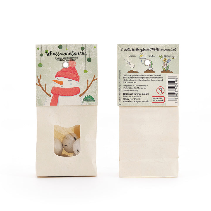 Dos bolsas de papel etiquetadas como "Snowman Bellies", con un dibujo de un muñeco de nieve en la parte delantera y una ventana con bolas blancas. Las instrucciones de plantación y la información del producto en alemán se encuentran en la parte trasera.