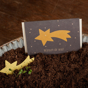 Tarjeta navideña con estrella fugaz "Pide un deseo"