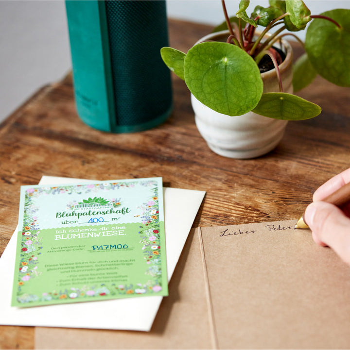Patrocinio de flores con tarjeta